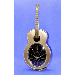Réveil Swiza musical en forme de guitare.