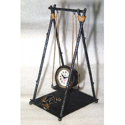 Originale pendule balançoire