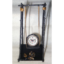 Originale pendule balançoire